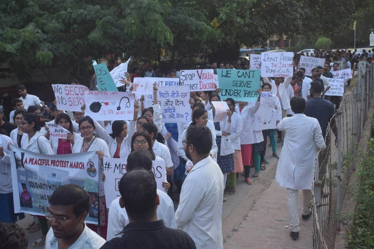 BHU hospital doctor march protest for security in strike