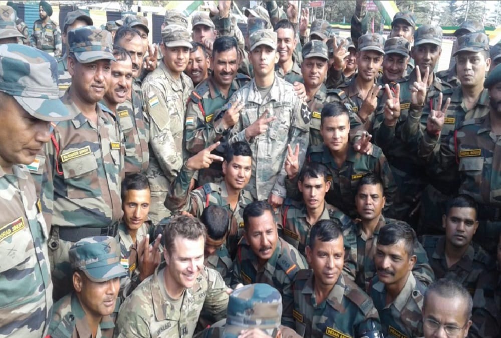 Indo Us army soldiers dance after successful anti terror joint military exercises
