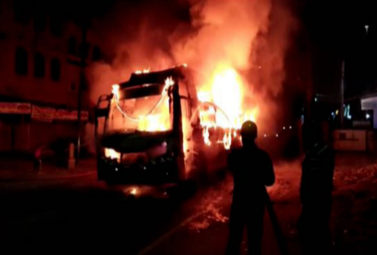 Naxalites set fire to passenger bus and looted phone and money