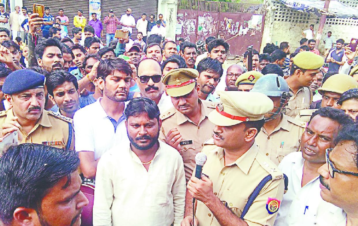 angry workers protest against the attack