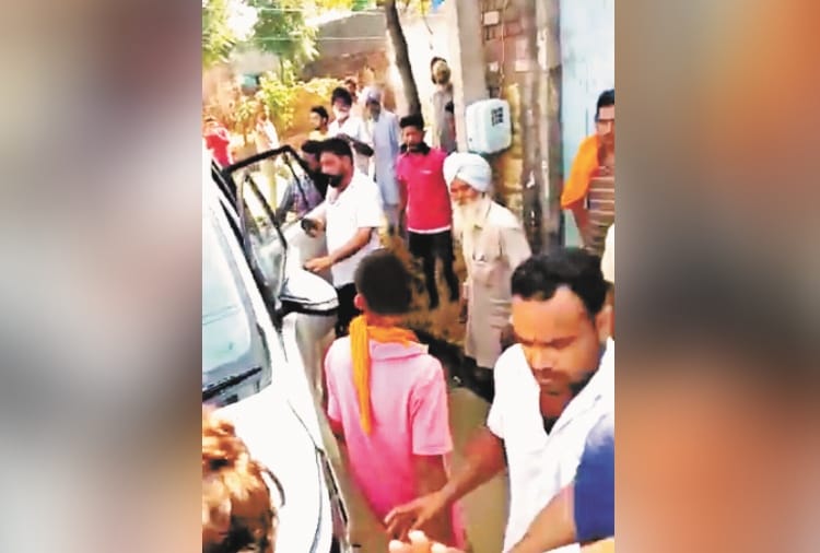 a Elderly death by crushing a car in Congress-Akali workers clash