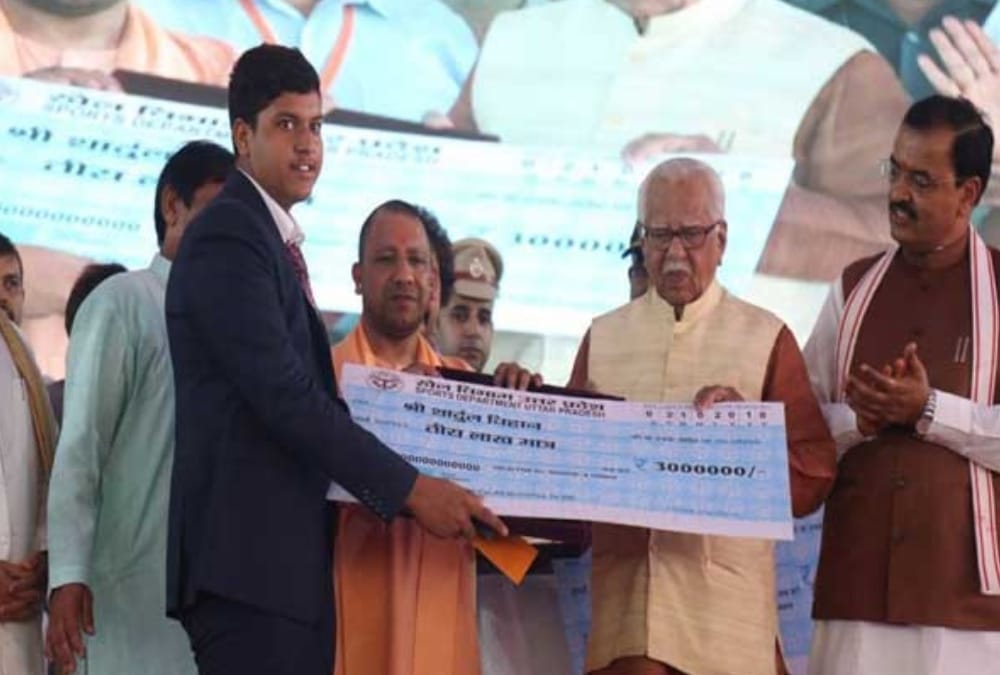 UP government honours medal winners of asian and commonwealth games.