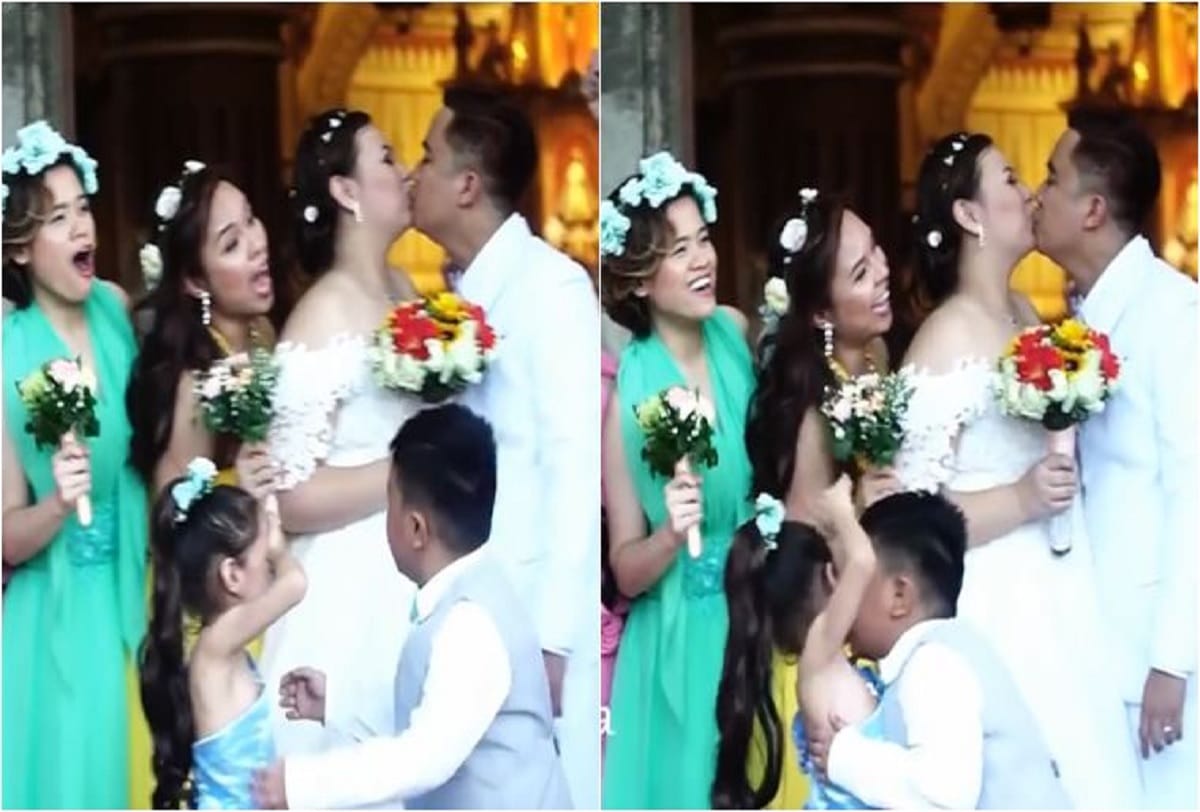 Photographer asks newlyweds to kiss, so page boy kisses flower girl