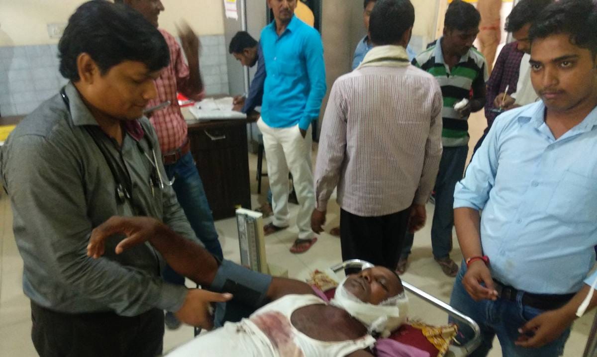 clash and firing in mau district between two groups