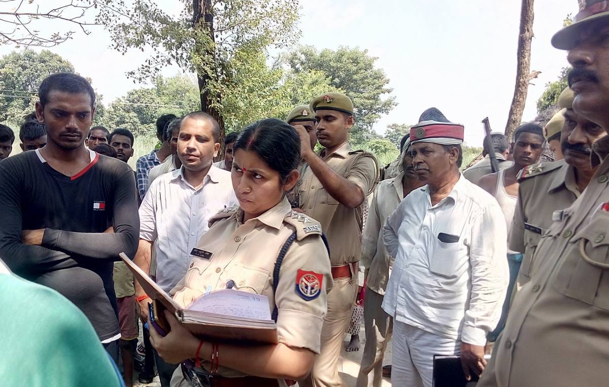clash and firing in mau district between two groups