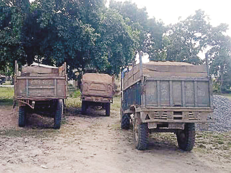 Holding three overload tractors