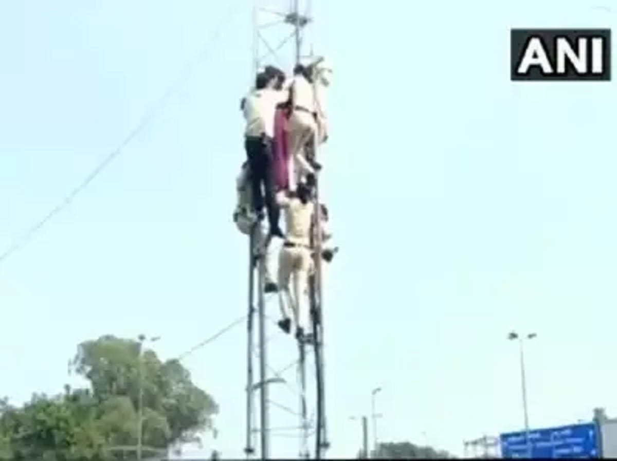 To convey her point the woman climbed to the tower in madhya pradesh bhopal fallen down