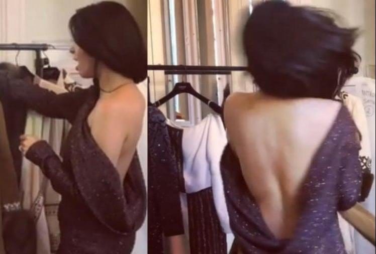 Mallika Sherawat look sensuous in this black backless gown