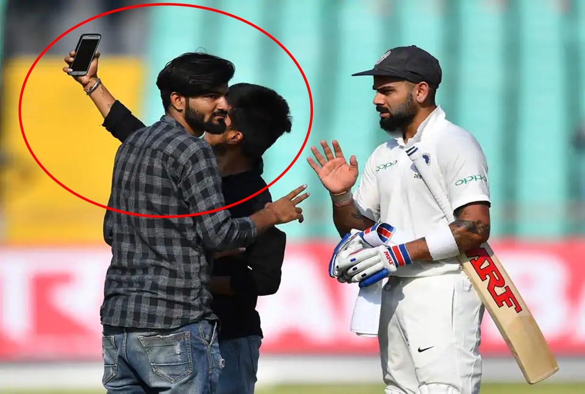 Fans try to click selfie with Virat Kohli during first day of Rajkot test against WI