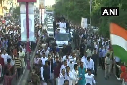 Congress President Rahul Gandhi addresses the people of Jabalpur during his road show