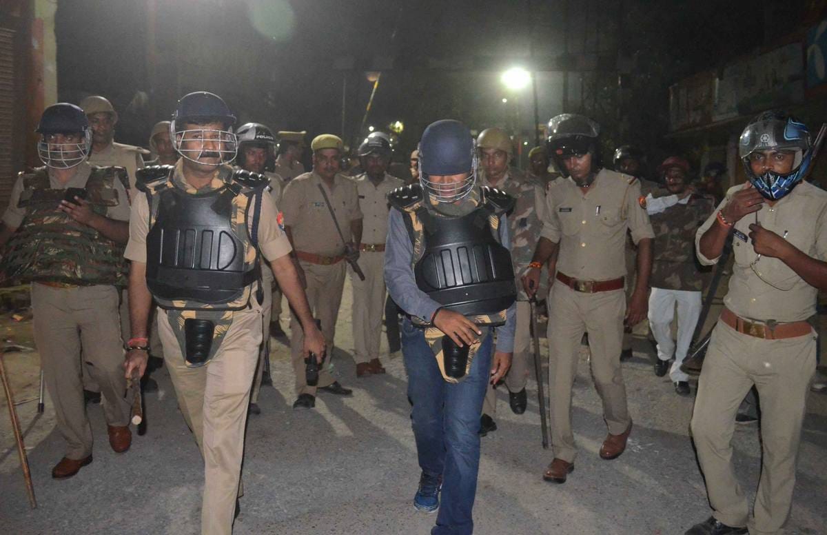 Two community dispute in varanasi police force manage situation