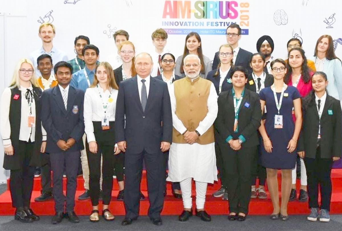 Rainbow international school students model present in front pm narendra modi and vladimir putin