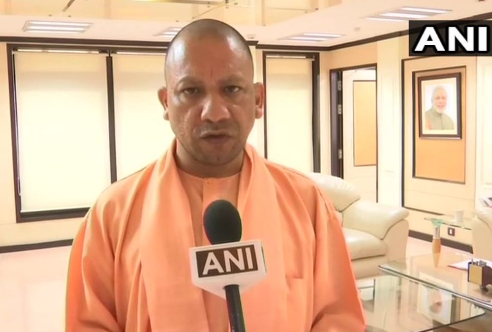 yogi adityanath talks to gujarat cm on fone over attacks on uttar pradesh and bihar people.