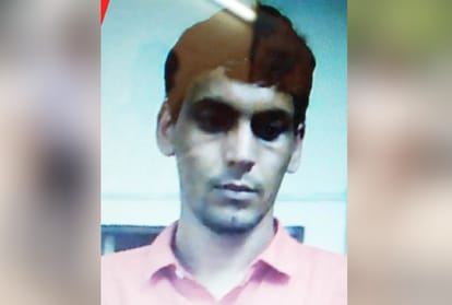 accused of 10 murder absconding from Police Custody after firing on police in hospital in faridabad