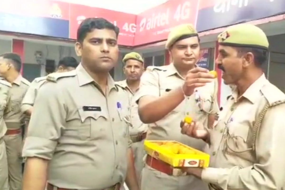 Police personnel at Meerut celebrate after state government decides to promote 25,091 constable