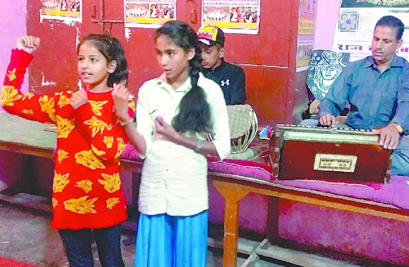 Girls play characters in Ramlila