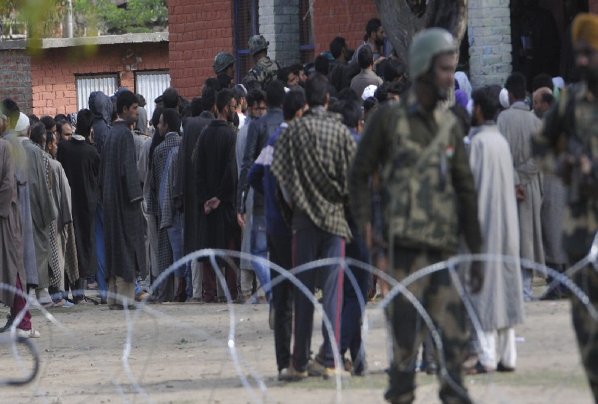 In Anantnag men wearing burqa to cast vote