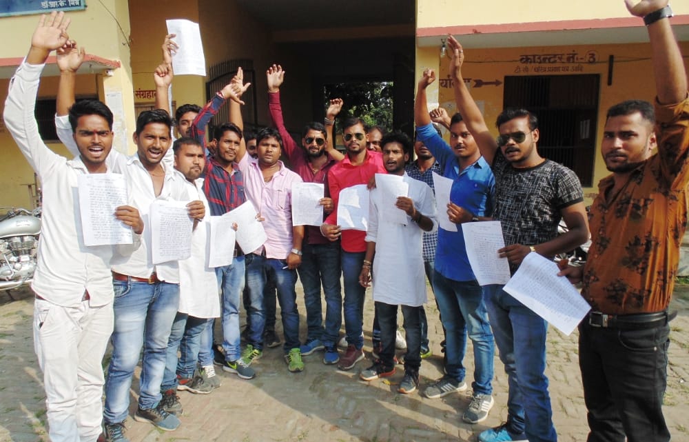 Writing of Ambedkar's photo in college