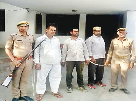 Police firing three assailants