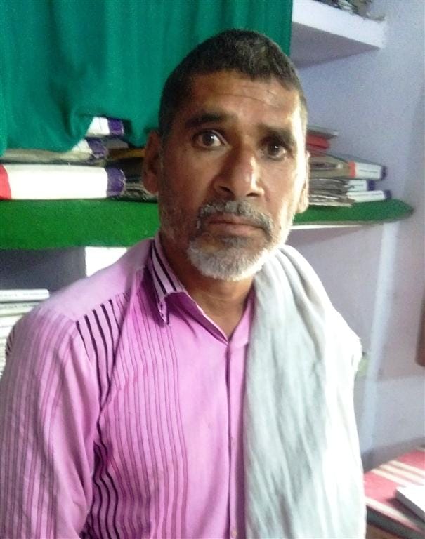 Looted farmer on new bridge of Karban river