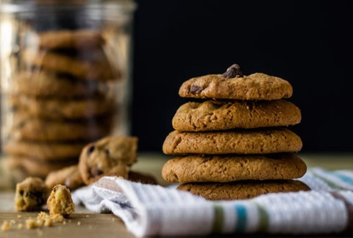The girl prepare cookies with grandfathers bone