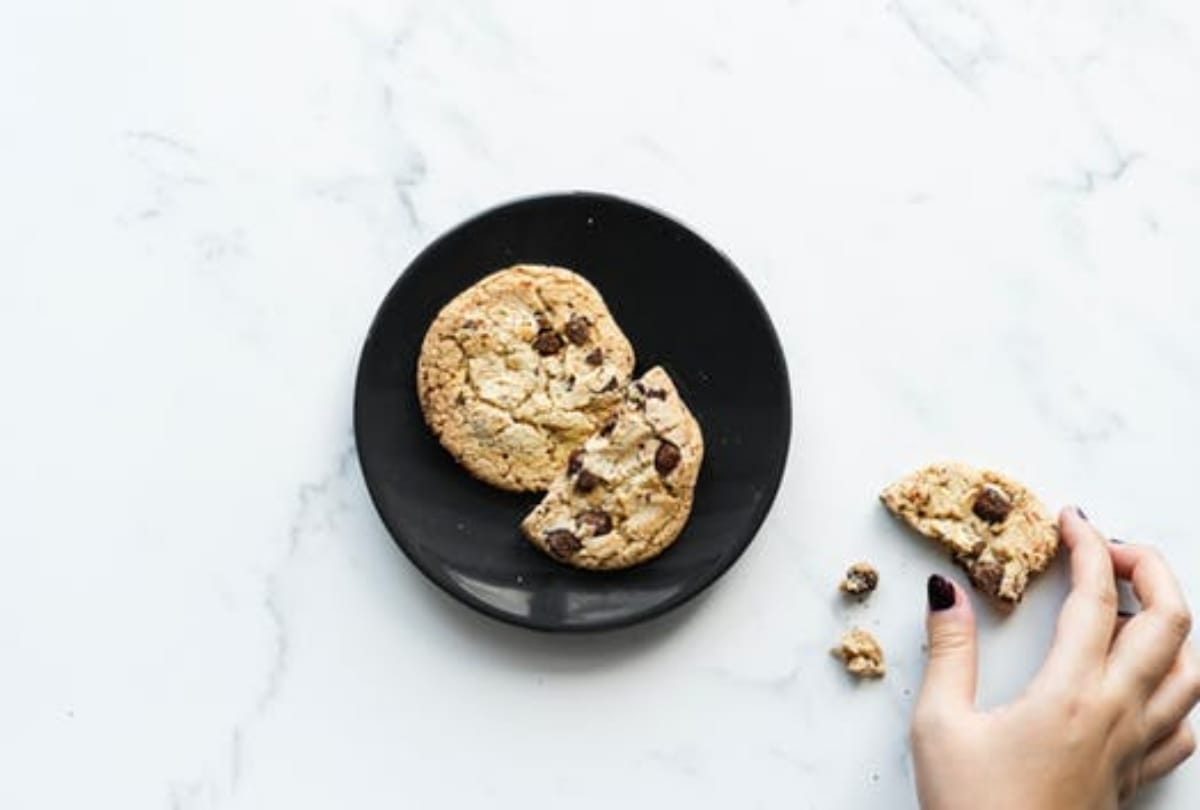 The girl prepare cookies with grandfathers bone