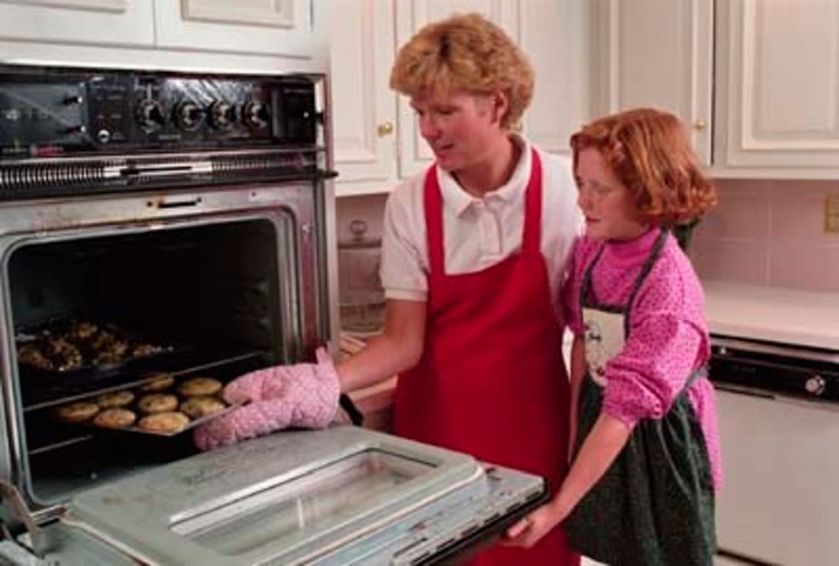 The girl prepare cookies with grandfathers bone
