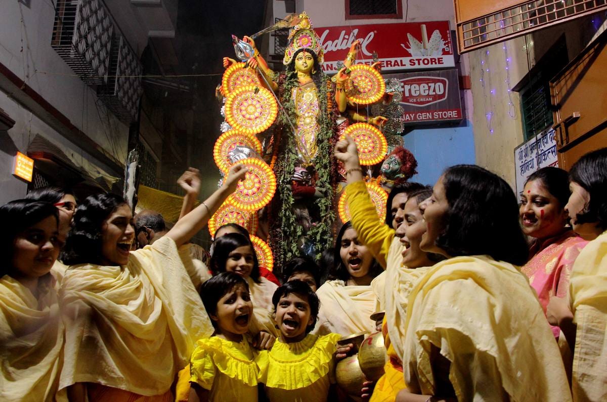 Durga visarjan in varanasi devotees said durga mata come back next year