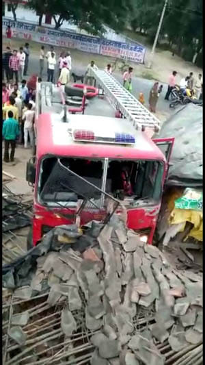 fire brigade truck hit a house