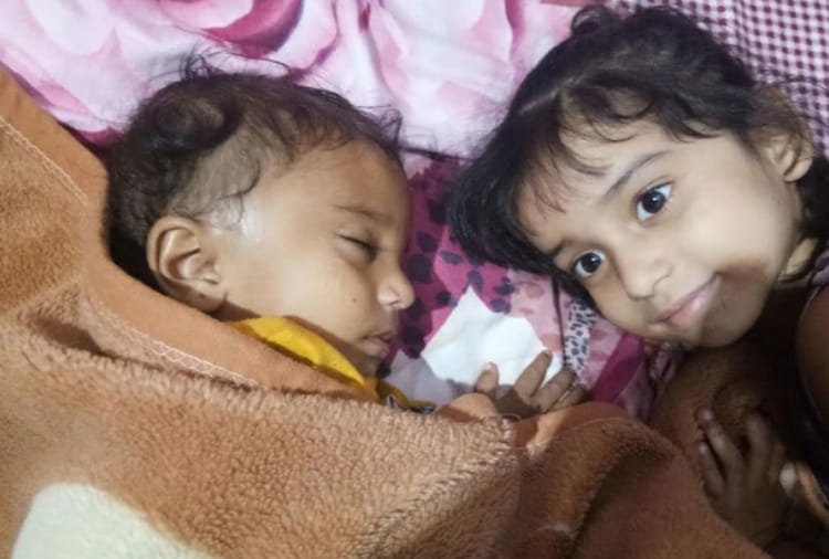 women saves a child into air before train hit his father and mother