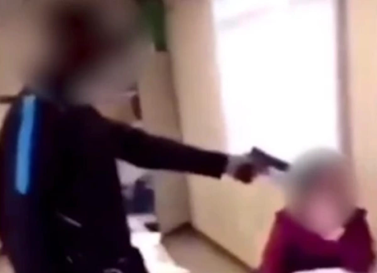 video goes viral when a teenage schoolboy pointed a gun at his teacher