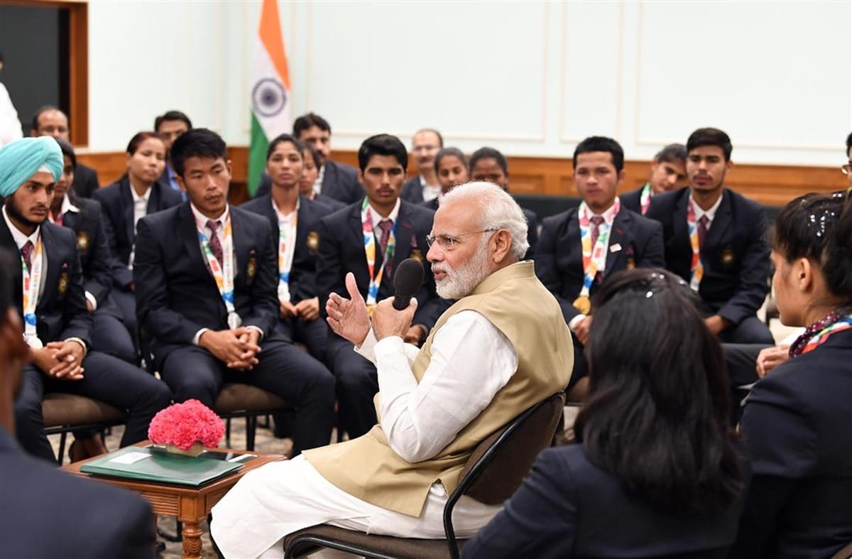 pm narendra modi meets youth olympic medal winners, ioa and rathore gives cash award