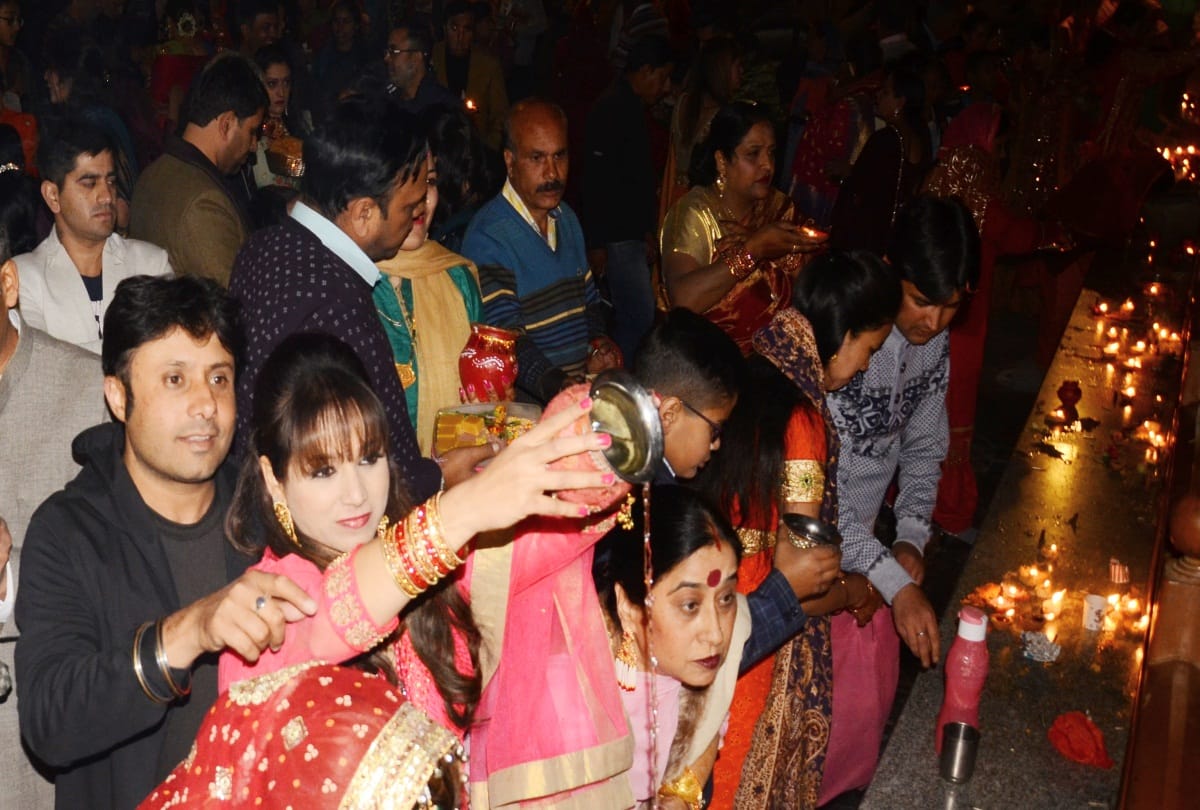 Suhaginas looked the moon after end the fast on Karva Chauth