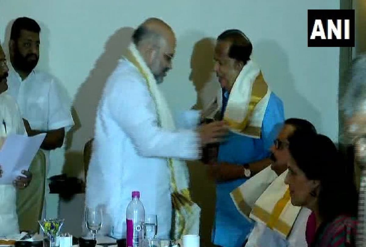 Former isro chief madhavan nair joined bjp in the presence of party president amit shah