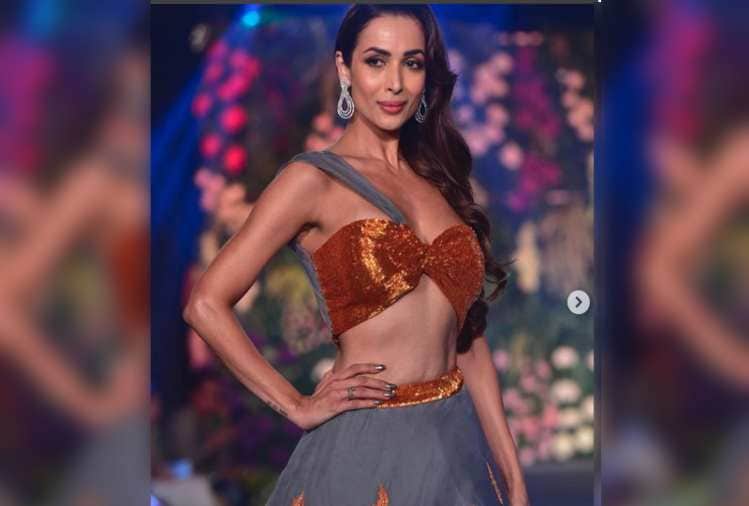malaika arora look beautiful in orange lehanga on karwachauth