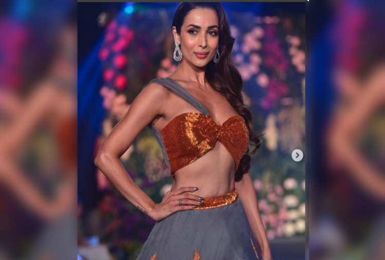 malaika arora look beautiful in orange lehanga on karwachauth
