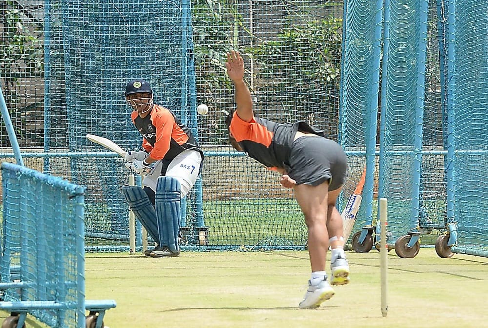 Under pressure to deliver, a determined Mahendra Singh Dhoni doing net practice