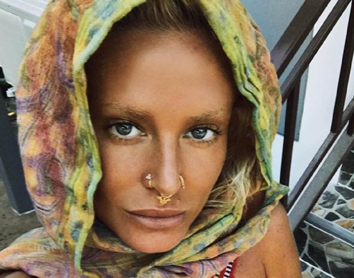 to inspire others Woman covers herself in blood