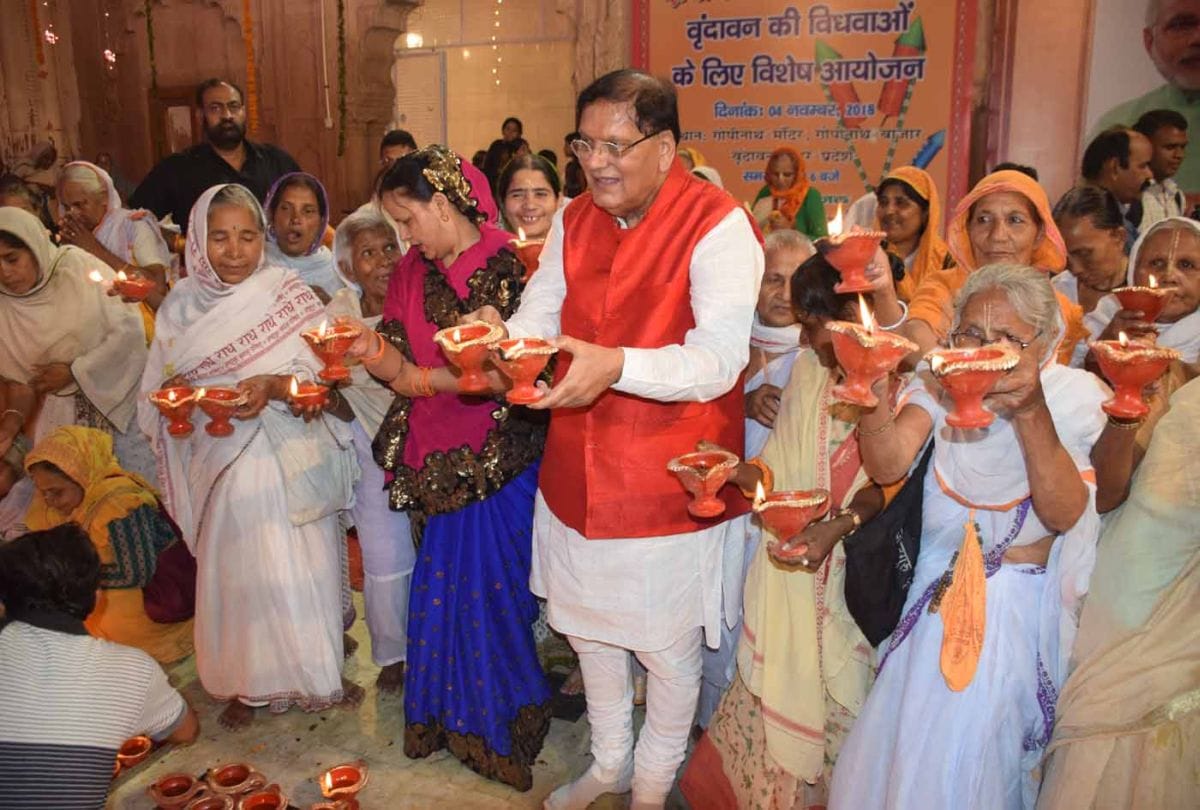 Widows cerebrating deepawali in gopinath temple in varindavan