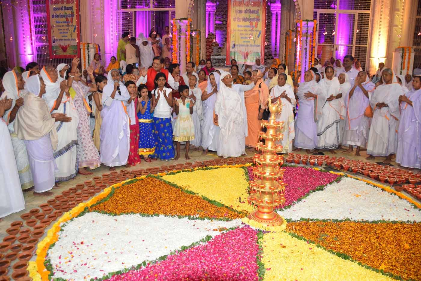 Widows cerebrating deepawali in gopinath temple in varindavan