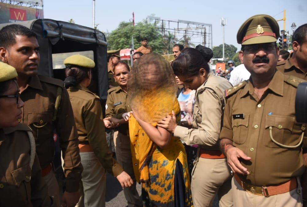 woman tried to self immolate in front of chief minister house in lucknow.