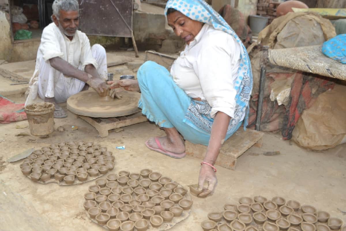 This Deeawali decorate your home with clay lamps beside chinese jhalar