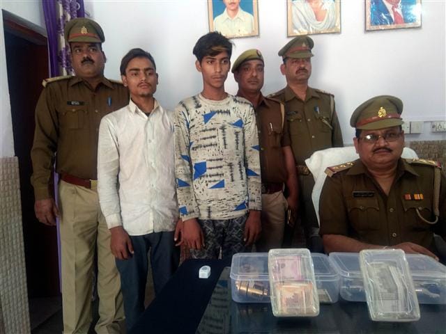 Two accused arrested with stolen cash