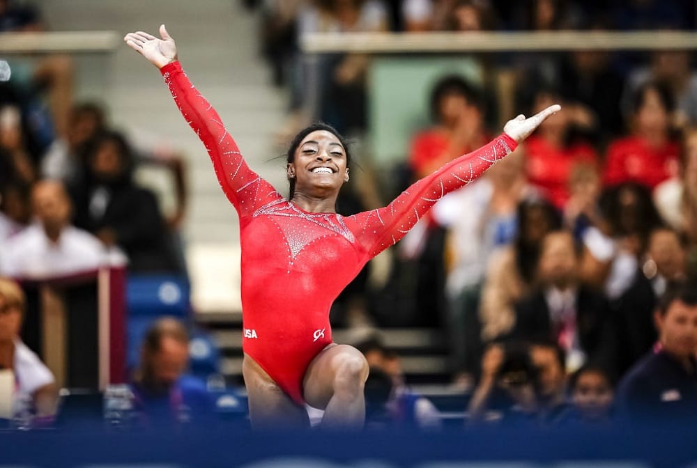 Simone Biles wins 15th world title as US claim team gold 