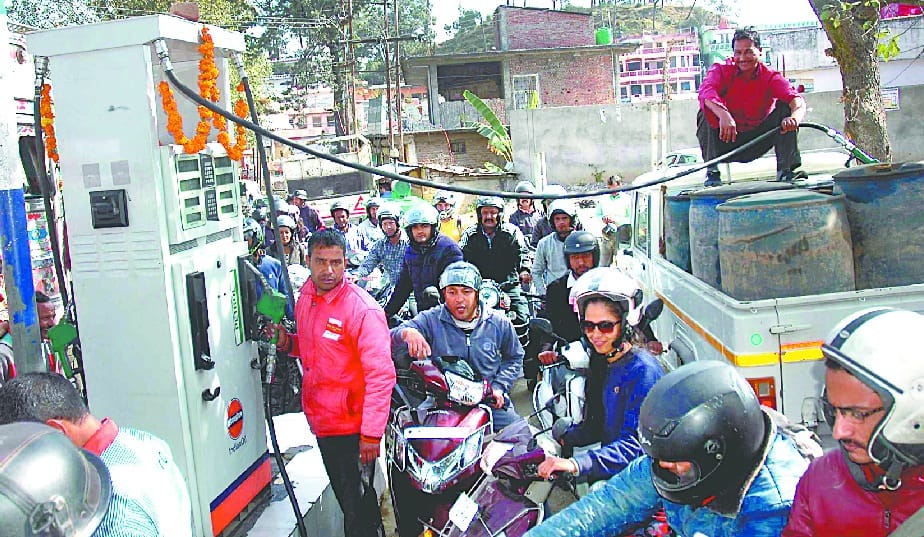 Getting the information about the arrival of petrol, the driver running towards the pump