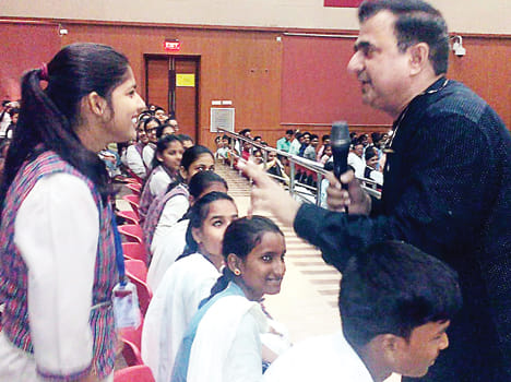 Warns school children about the dangers of the cyber world