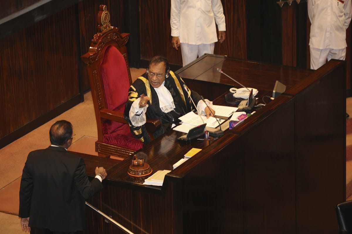 Fight in Sri lanka Parliament, Throwing dusbin on speaker