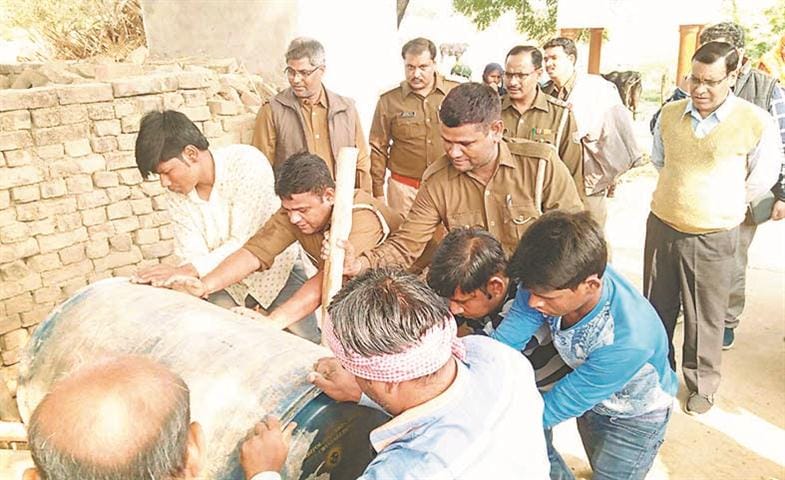 Dump 14 drum spirit recovered for illegal liquor