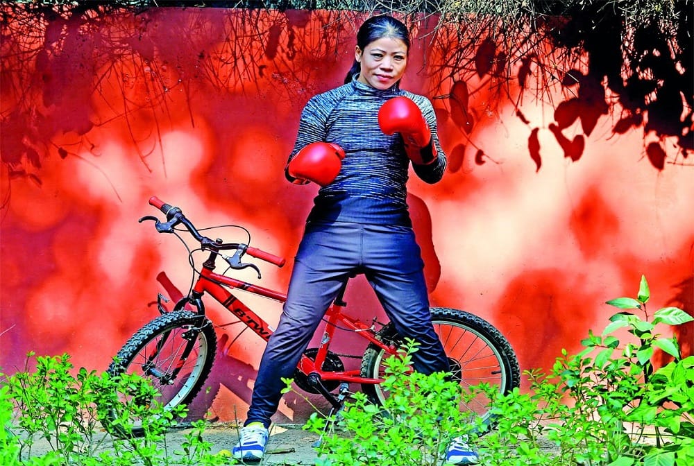 mary kom ready for boxing practice with a male trainer