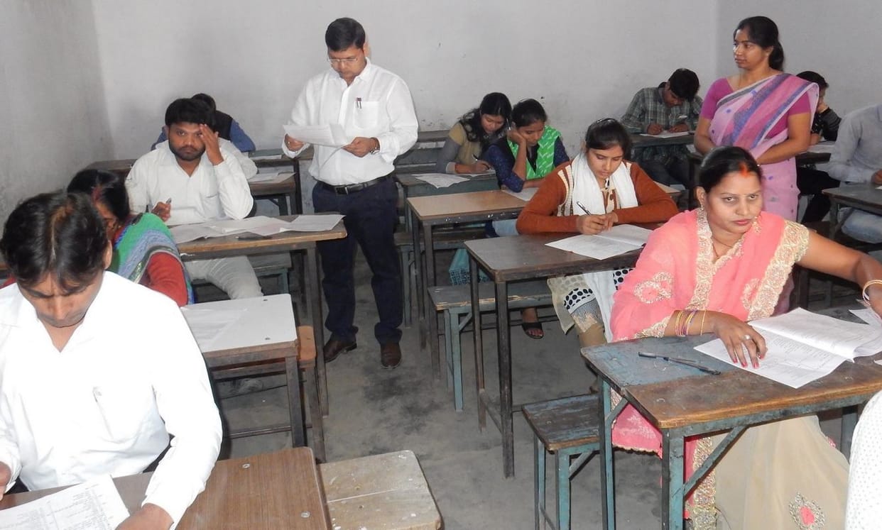 lady shikshamitra caught with electronic device in tet exam